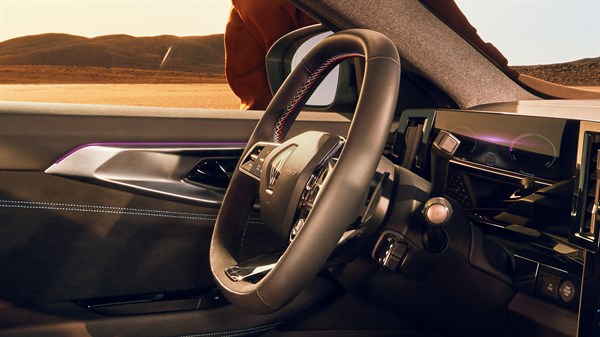 alt="renault austral esprit alpine version - nappa leather steering wheel with Alcantara insert detail "